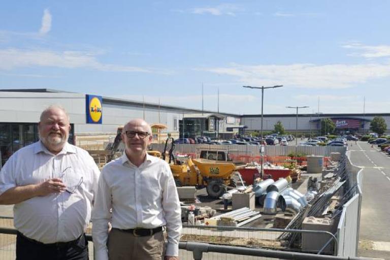 Cllr Neil MacDonald and Cllr Colin Kreidewolf outside the new Lidl at Anglia Retail Park in Ipswich