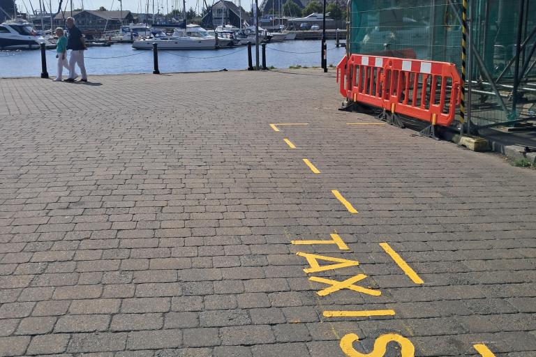 View of Key Street at Ipswich Waterfront with road marking for Taxis