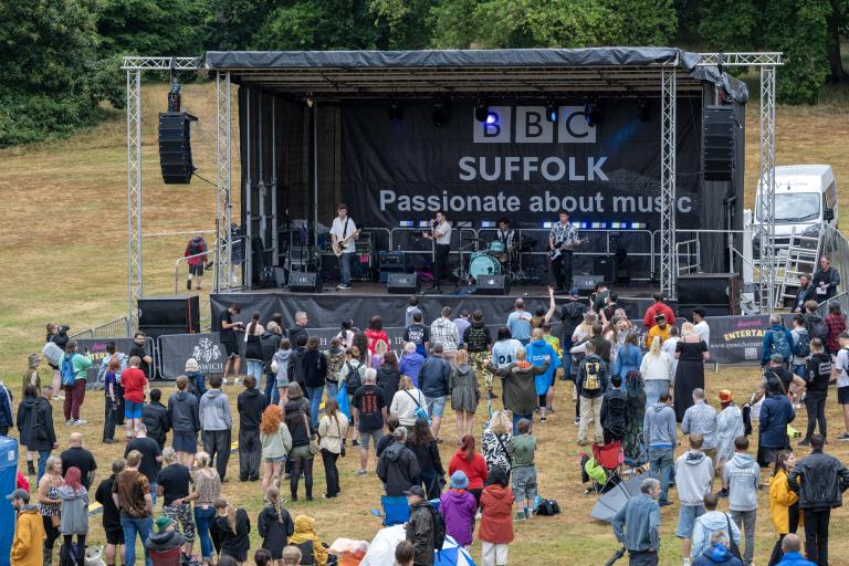 People enjoying stage performance at Ipswich Music Day in 2025