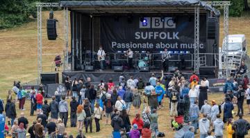 People enjoying stage performance at Ipswich Music Day in 2025